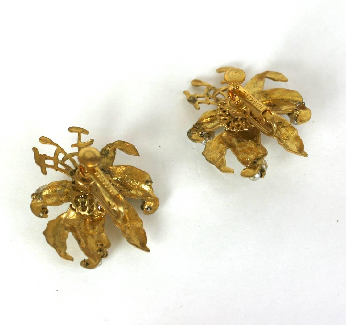 Miriam Haskell Russian Gilt Madonna lily earclips, hand sewn with faux baroque pearls and gold faceted beads. 
Clip back fittings. 1950's USA. 
Excellent Condition. 
L1.50 x W 1 5/16