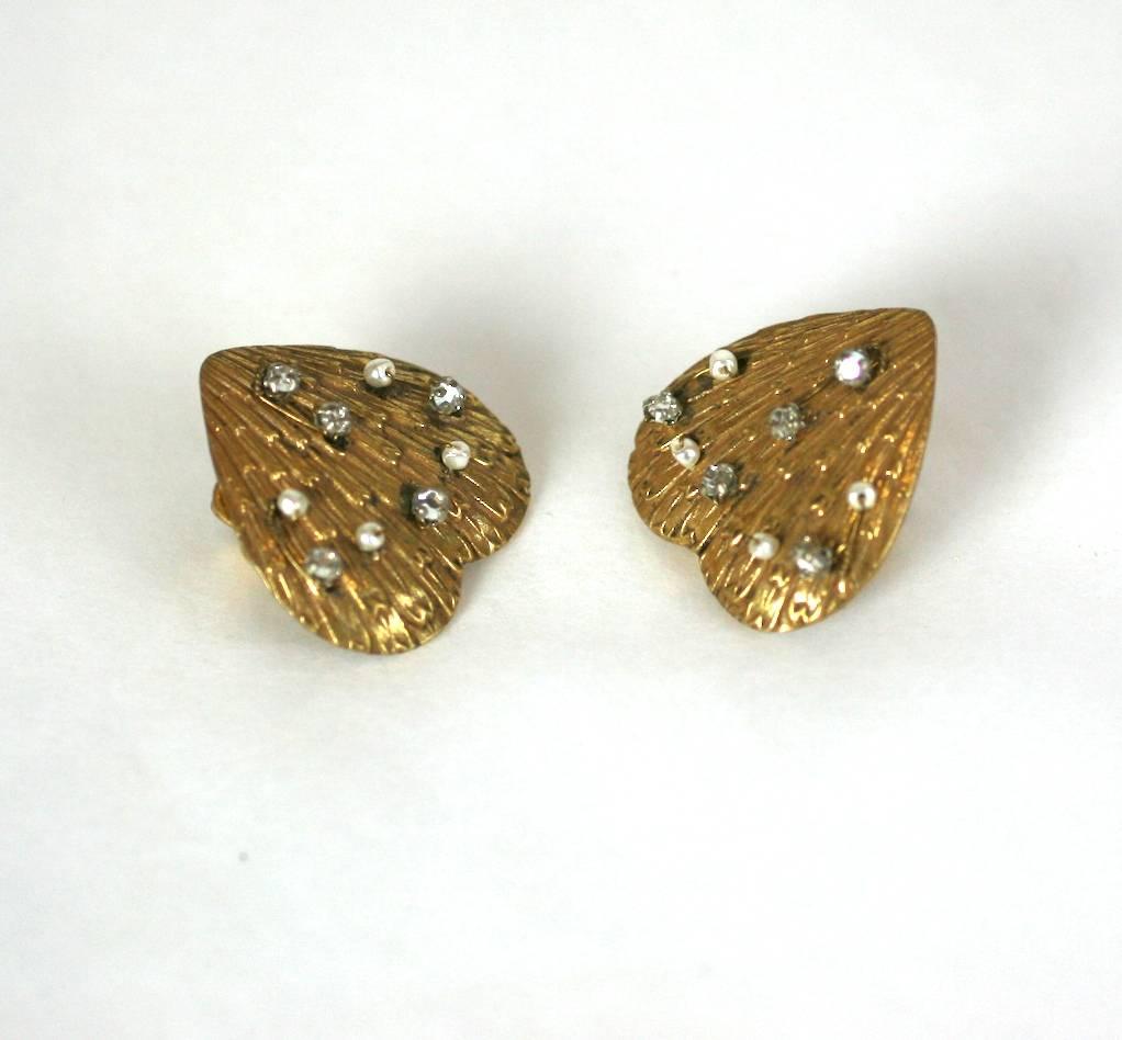 Miriam Haskell textured Russian Gilt heart formed ear clips, hand sewn with faux seed pearl and crystal rose montees. 
Clip back Fittings. 1950's USA.
 Excellent Condition.
Length 1