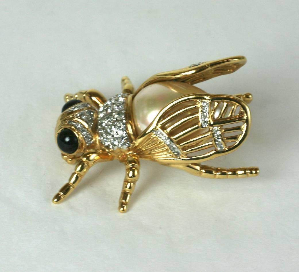 Large Vogue Bijoux Pearl Body Bug Brooch from the 1980's. Large faux pearl forms "body" with pave trimmed gilt wings and jet cab eyes.
2" x 2" x.75". 1980's Italy.
Excellent condition. 
