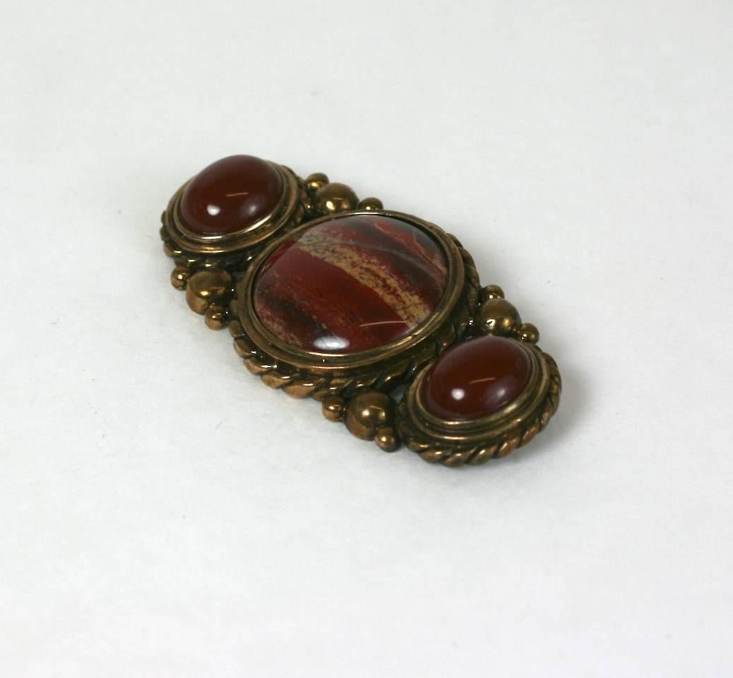 Attractive Agate and Antique Bronze Brooch by Stephen Dweck. Natural agate cabochons are mounted into ornate wire and ball frame settings. 
Signature filigree work on back of settings. Unsigned. Excellent condition. 1980's USA. 
2.75" x