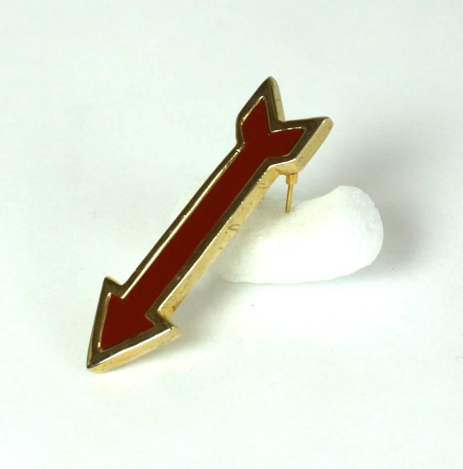 Enamel Red Arrow Clip/Pendant by Les Bernard. Double prong clip fittings allow brooch to sit in any position. This unusual clip works well also as a pendant attached to a fine chain. 1980's USA. (chain not included). 
2.75" x .75".