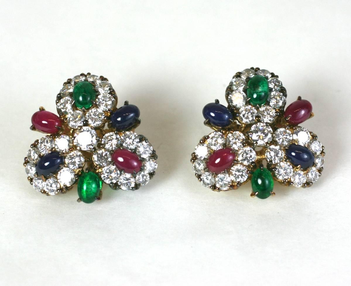 Jolie Gabor faux gemstone earclips, of gold washed sterling silver with faux  crystal paste diamonds, ruby, sapphire and emerald cabochon stones.. Provenance Bunny Mellon.
Excellent Condition
Length 1" Width 1"

Jolie Gabor Countess de