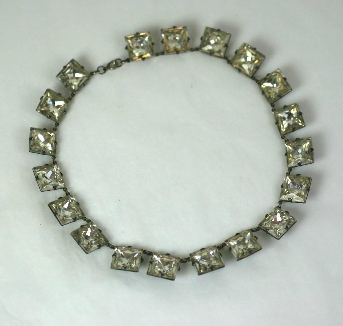 Art Deco paste riviere necklace set in sterling silver. Of large faceted square cut crystal paste stones in four prong closed back settings. Marked 