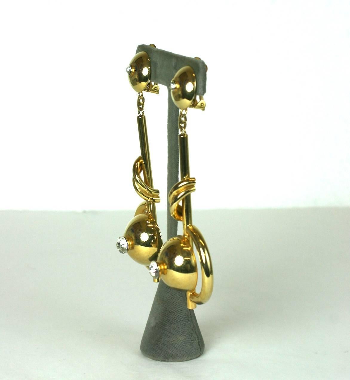 Ugo Correani oversized gilt metal and crystal paste Modernist long earrings. Unsigned. Excellent Condition. 1980's Italy. 
Length 4"
Width 1 .25"