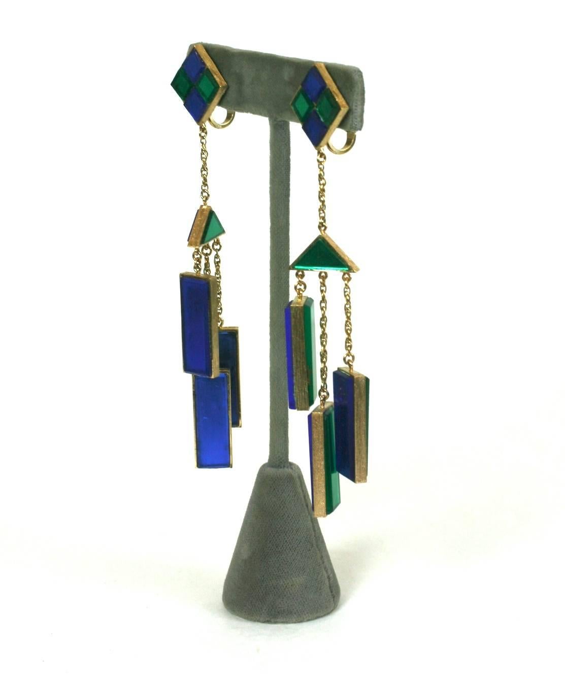 Trifari Mirrored Tile Mobile Earrings, oversized Mod styling with panels of royal blue and emerald glass mirror which move with the wearer. Clip back fittings. 
1960's USA. Excellent condition. 
4" x 1". 