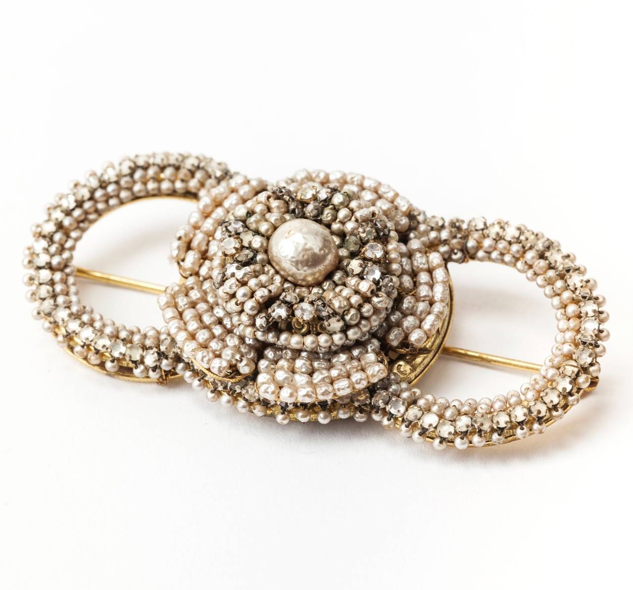 Miriam Haskell signature baroque faux pearl and crystal diamante camellia flower ring brooch from the 1940's. Exquisite scale and condition. Early M.H. mark. 1940's USA.