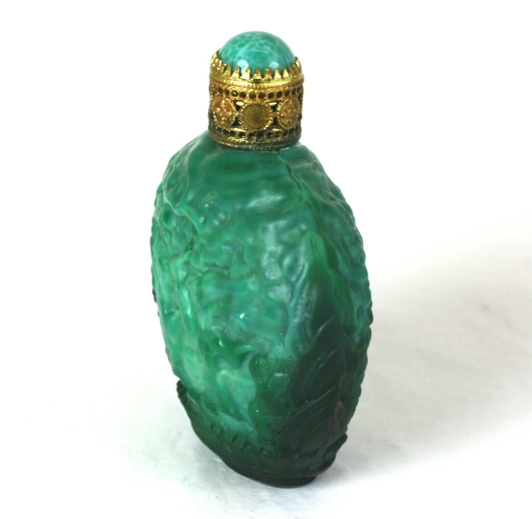 Malachite glass scent bottle by Hoffman/ Schlevogt, evening bag size. Made in the early 1930's with Chinoiserie patterns and a gilt filigree metal screw top with faux jade cabochon. Includes original glass dabber. Excellent condition. 1930's