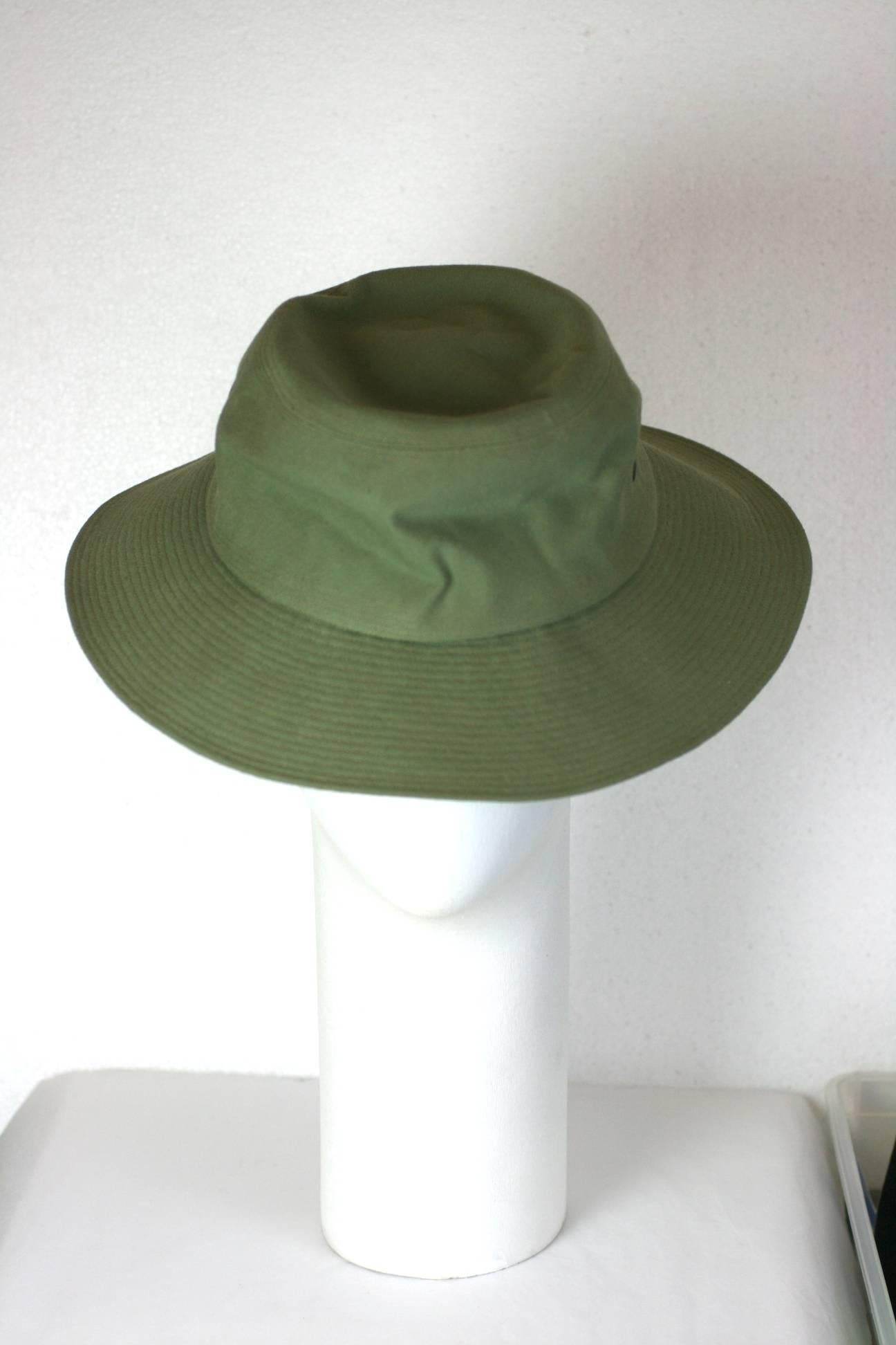 Yves Saint Laurent Fisherman Hat, by Alber Elbaz. A version of the famous YSL hat made in the 1960's. This brim of this cotton canvas hat is topstitched and is slightly deeper in the back. 
Very Good condition. Small mark near top, see image.