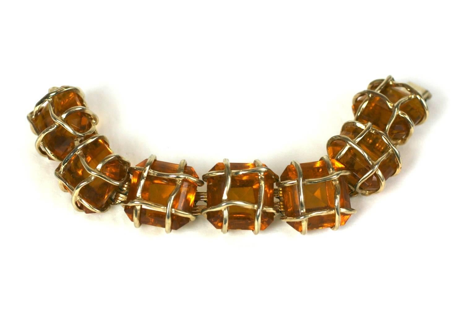 Ledo Caged Topaz Link Bracelet in the Verdura style from the 1950's.  Lido caged faux topaz link bracelet of gilt metal irregular cages inclosing the faceted rectangular stones. Excellent Condition 

Excellent condition. 1950's USA. 