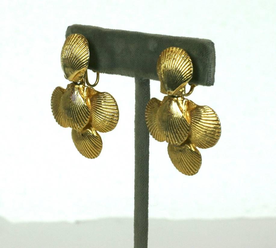 Mimi Di Nardo Shell Earclips with articulated drops. Classic summer motif with gilt metal shells. 
1970's USA. Excellent condition. 
1 5/8