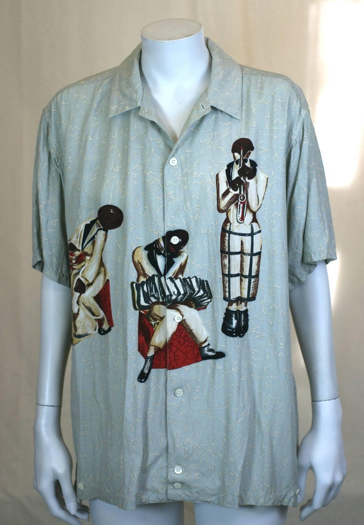 Early mens rayon camp shirt by Takeo Kikuchi for Charivari. Amazing graphics were the hallmark of many of the Japanese mens wear designers of the 1980's. Here a African American Jazz band graphic is depicted in a Deco style on an elongated, squiggle