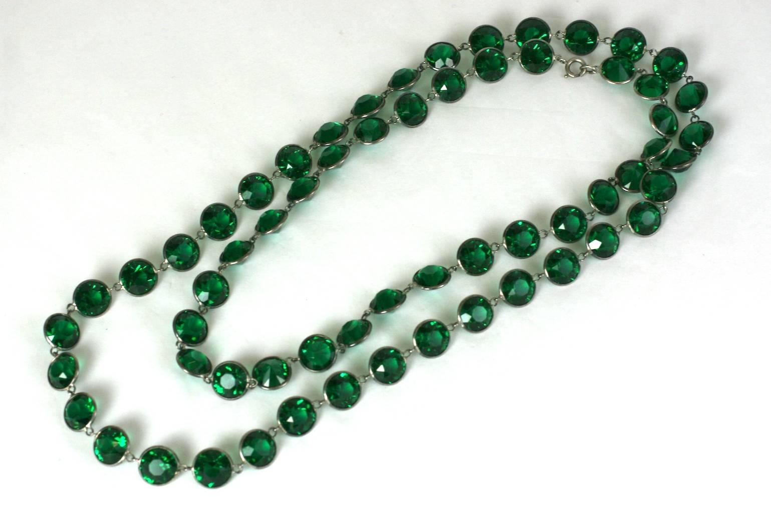 Art Deco Emerald Crystals in deep green, lead crystal for extra sparkle and weight with spring clasp which allows doubling. 
Nice quality circa 1920's. 
40" x .5".
Excellent condition. 