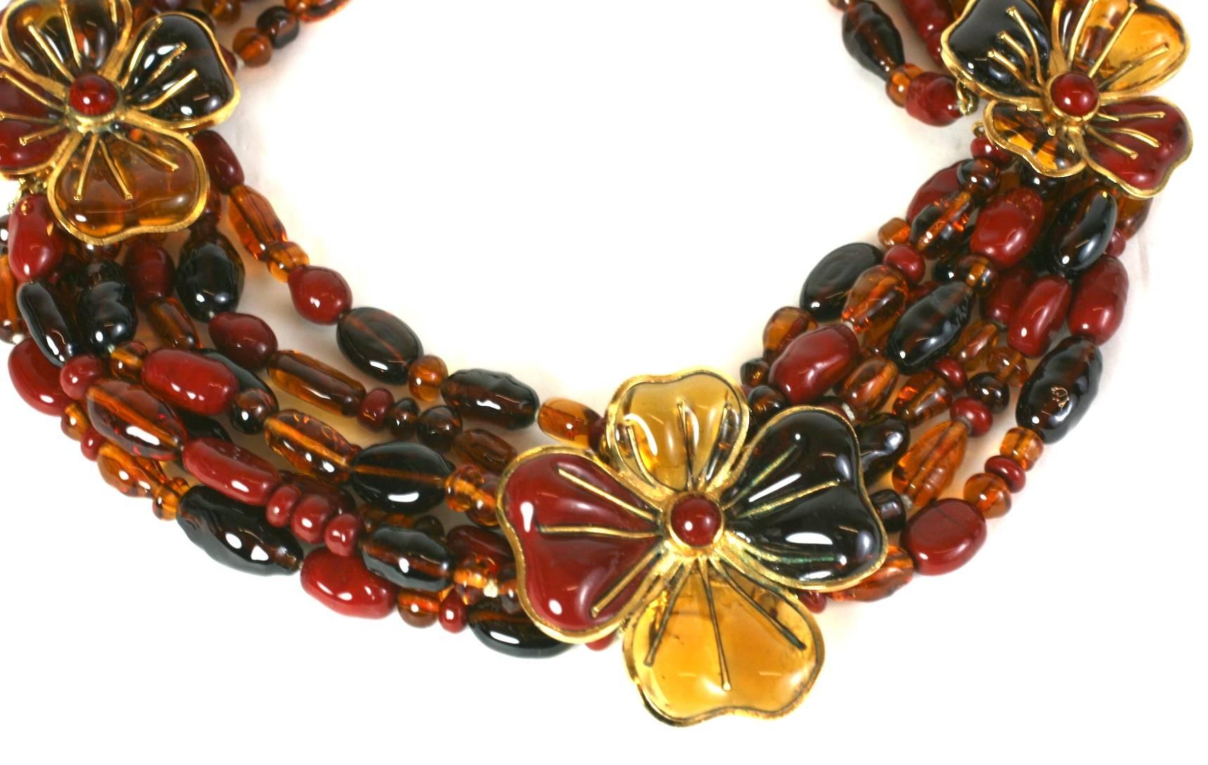 Striking Histoire de Verre Autumnal Pate de Verre Suite Necklace with large bib necklace and ear clips.
Completely handmade poured glass flower stations with hand made beads in tonal autumnal colors. Completely hand made in the Gripoix manner. Clip