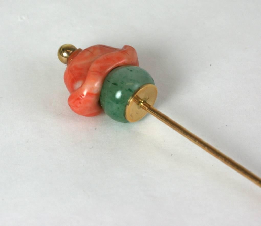 Large Coral and Adventurine Stickpin attributed to Seaman Schepps. Likely antique carved stone elements set onto 14k gold. 
1940's USA. Excellent Condition. Unsigned. 
Length 3.75"
Width .75"