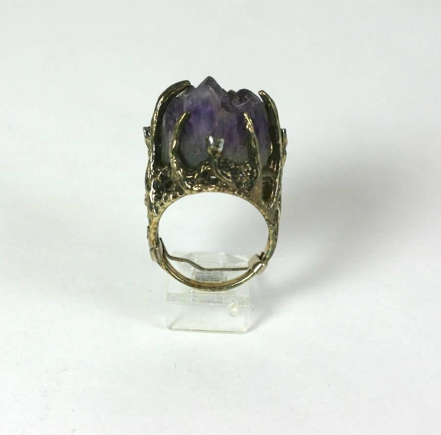Panetta Artisan style Brutalist  ring with raw amythest geode and abstract prongs with tiny pave accents. Large scale cocktail ring set in sterling vermeil.  1970's USA. 
Signed Panetta. Excellent Condition. 
Ring Size 8.5. 
Height 1.25"
Width