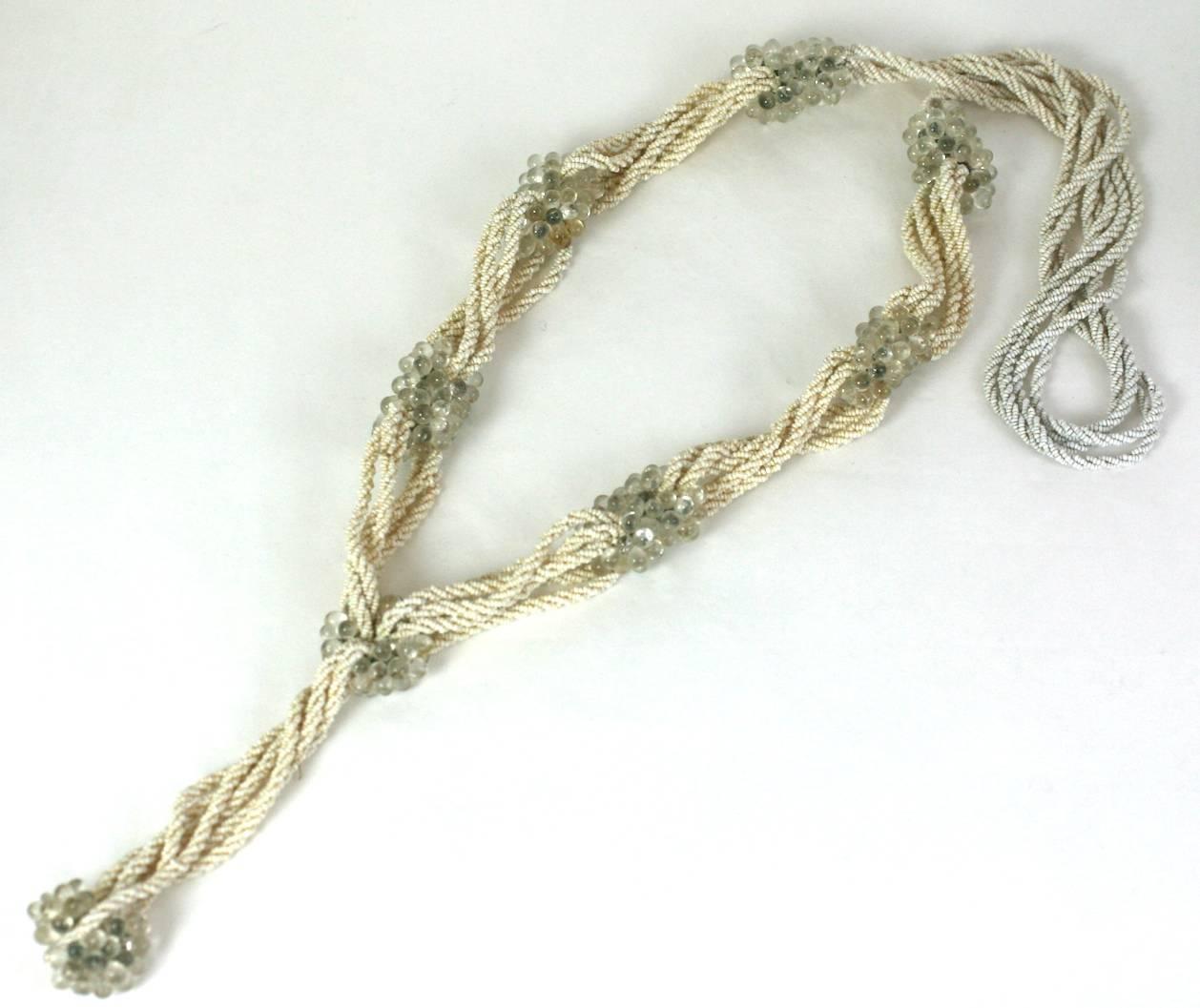 Early Maison Gripoix 1920s sautoir. Elegantly composed of crystal pate de verre teardrop bead clusters and twisted braided lengths of micro faux seed pearls. Long flapper length. 
Excellent Condition, 1920's France. 
Length 21"
Length Pendant 