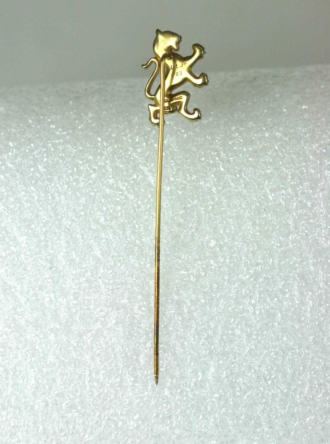 Tiffany and Co. 14 kt gold Lion Passant  stickpin. The strutting lion a common charge in heraldry.
Signed Tiffany and Co, 14 kt. 
Excellent Condition. Lovely quality, 1920's USA.
3" x .5"