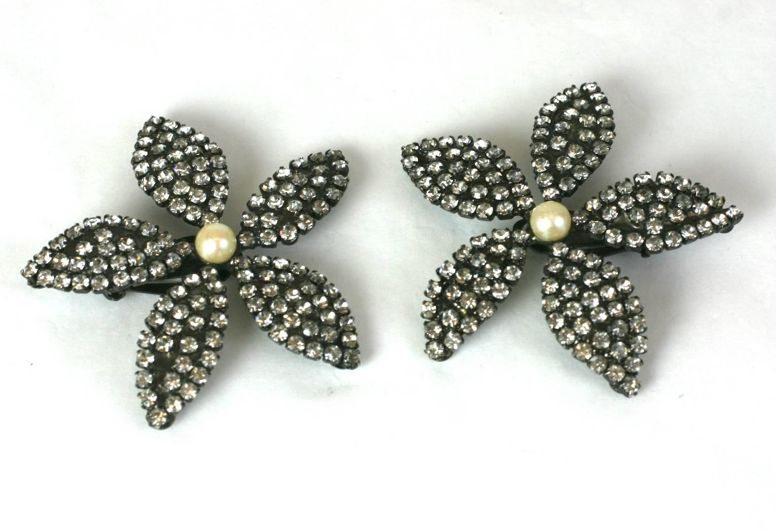Large Butler Wilson Pave Flowerhead Earclips with clip back fittings. Crystals are set in blackened metal for contrast. 
1990's UK.  2.25"
Excellent condition. 