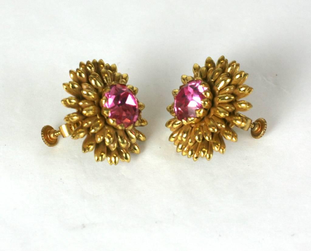 Miriam Haskell signature Russian Gilt, double petal filigree flower head earclips with rose pink faceted crystal focal stone. 1940's, Adjustable clip back fittings. 
Excellent Condition.
L 1 "
W 1"