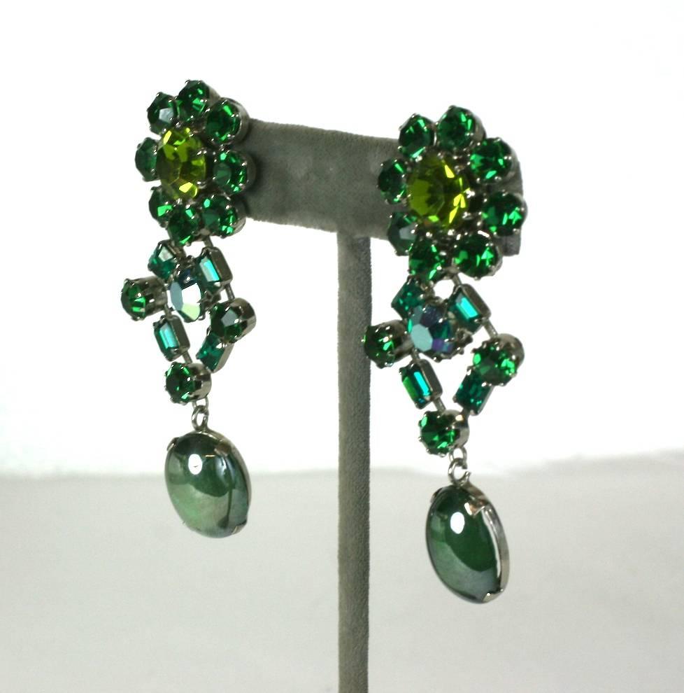 Long Austrian Crystal Earrings in wonderful tones of emerald and olivine. An unusual mix with Aurora Swarovski stones, flashed crystals and unusual cabochon drops. 1950's Austrian.
Excellent condition. 
2.75" x 1". 