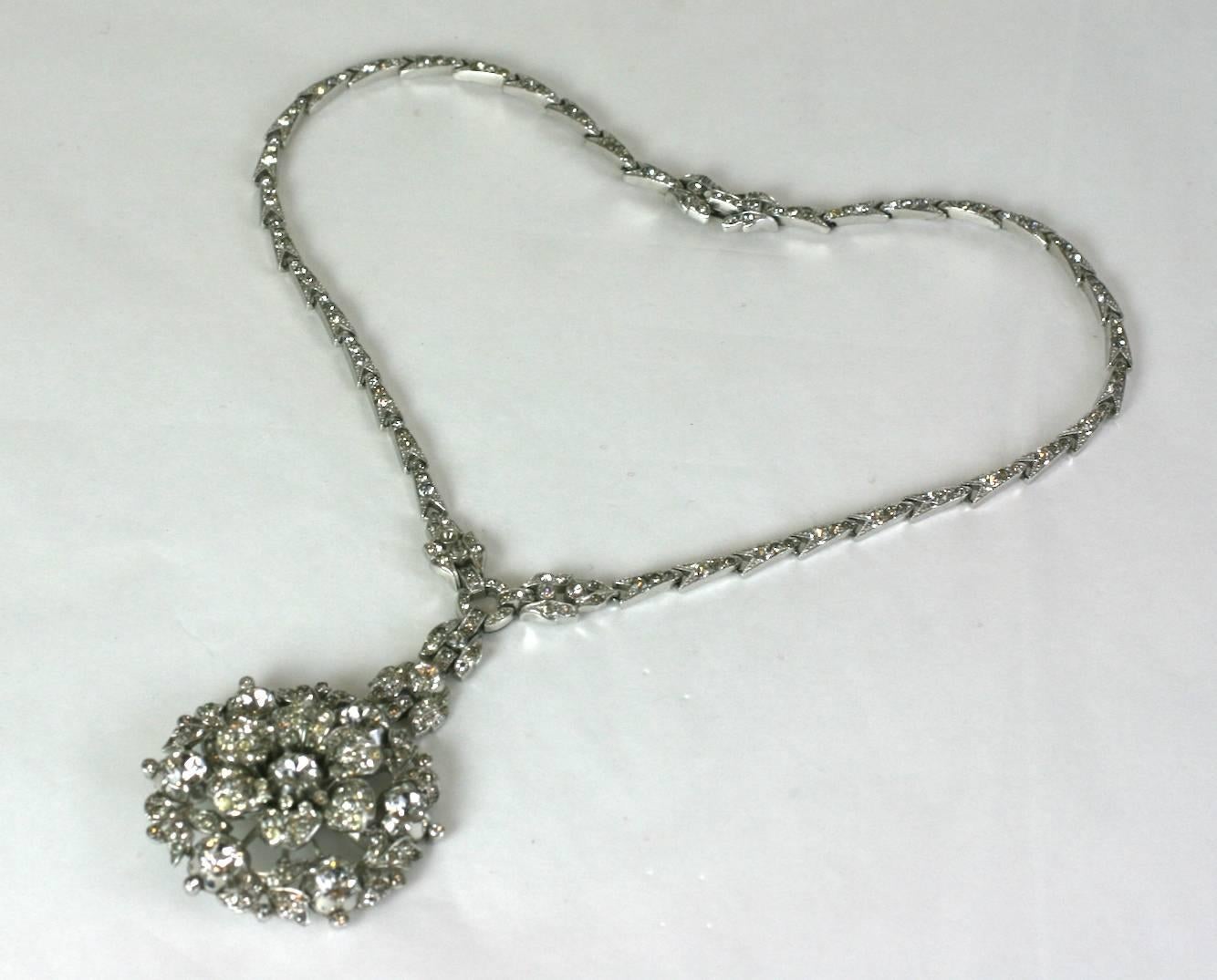 Trifari Alfred Philippe Pave  Regence Georgian Revival tremblant rose with garland pendant necklace of rhodium plated metal, and faceted crystal  rhinestones. 
Marked: Trifari with Crown, 1930's USA. 
Excellent condition. 
L 17