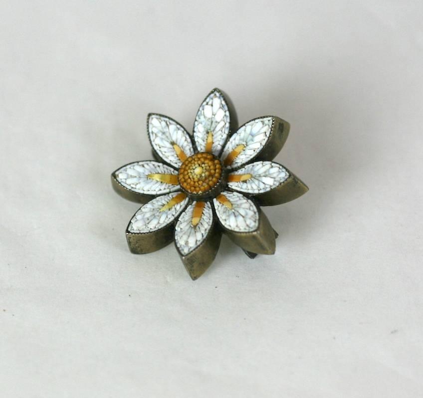 Victorian Micromosaic Daisy Brooch from the mid 19th Century.  Delicate scale with extremely fine tesserai forming a charming daisy motif.  Wonderful dimensional, quality mosiac work.  1860's Italy. 
7/8
