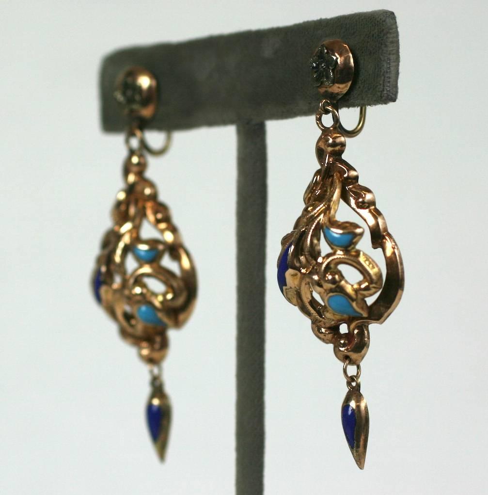 Attractive Victorian Enamel Earrings in 14k gold with deep blue and aqua enamel detailing. Ornate high Victorian styling. 1870's European. Screw back fittings. 
2.5