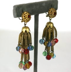 Louis Rousselet, fermagli per orecchie con nappe e cristalli dorati