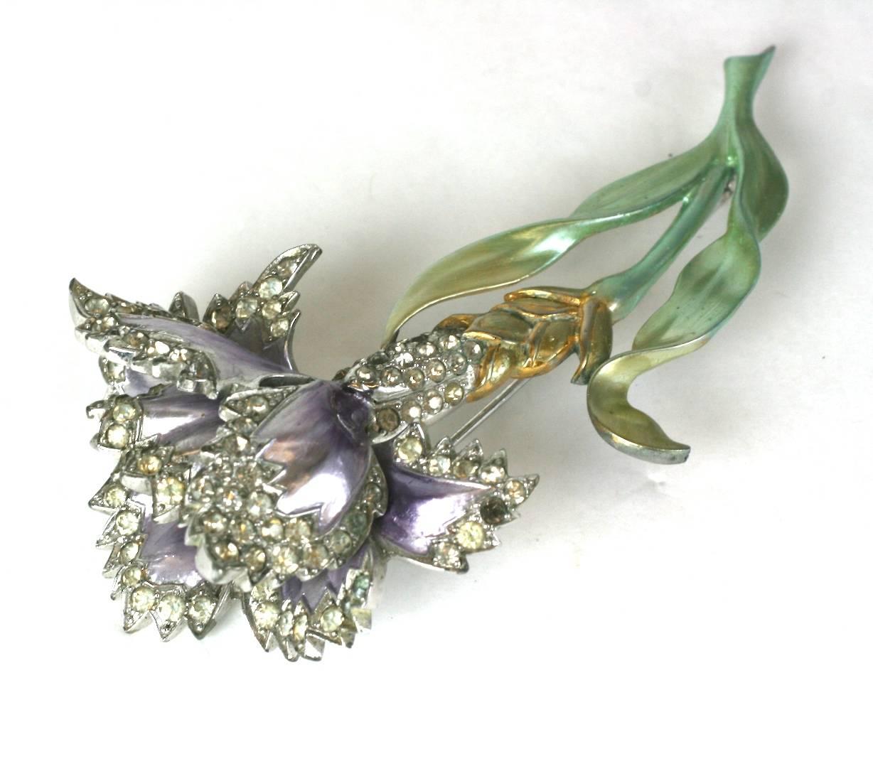 Collectible Marcel Boucher Retro Carnation brooch, of signature hand painted pearlized enamel in shades of pale greens, yellow, and lilac. The flower head of rhodium plate and crystal pave.
Excellent Condition, Striking scale,  Unsigned.
L 3.75