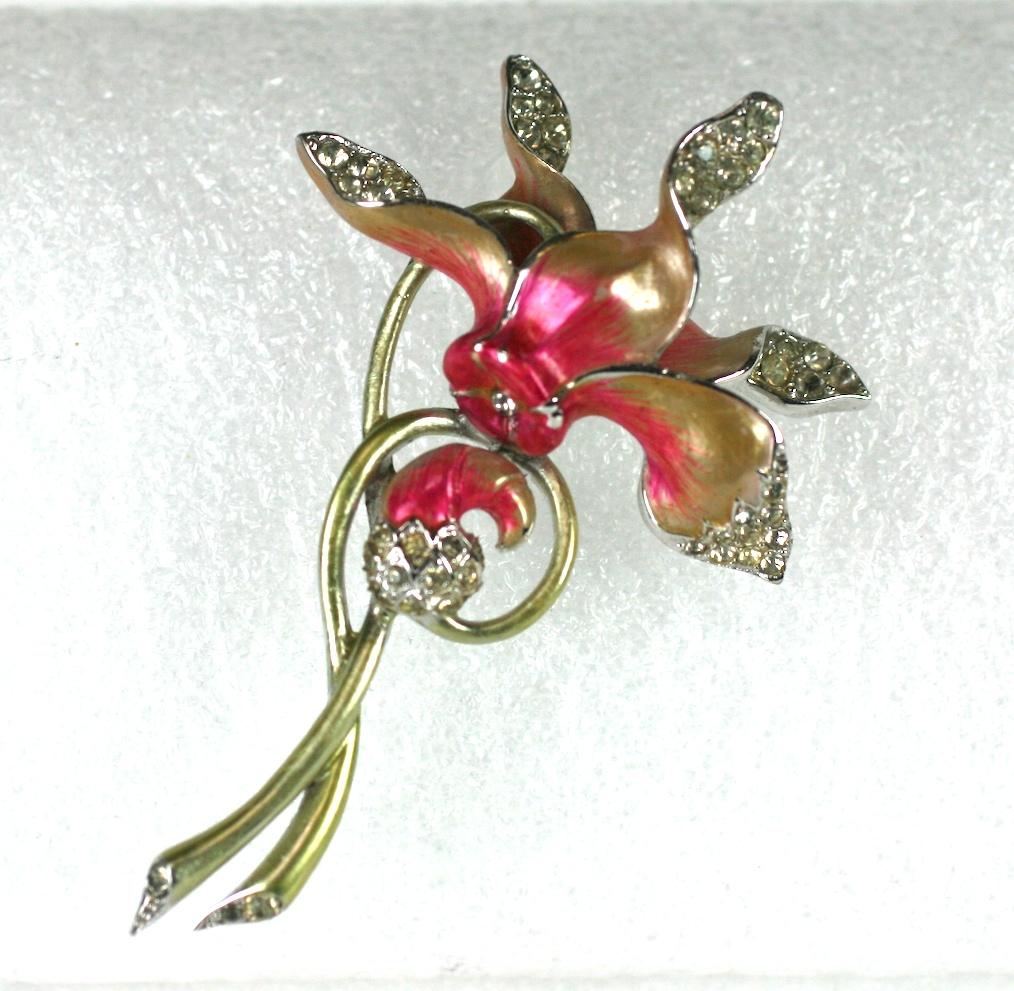 Marcel Boucher Cyclamen flower spray retro brooch of rhodium plated  metal, crystal pave rhinestones, hand  pearlized pastel enamelling.
Marked: MB (phrygian cap)
Excellent Condition
L 3.45