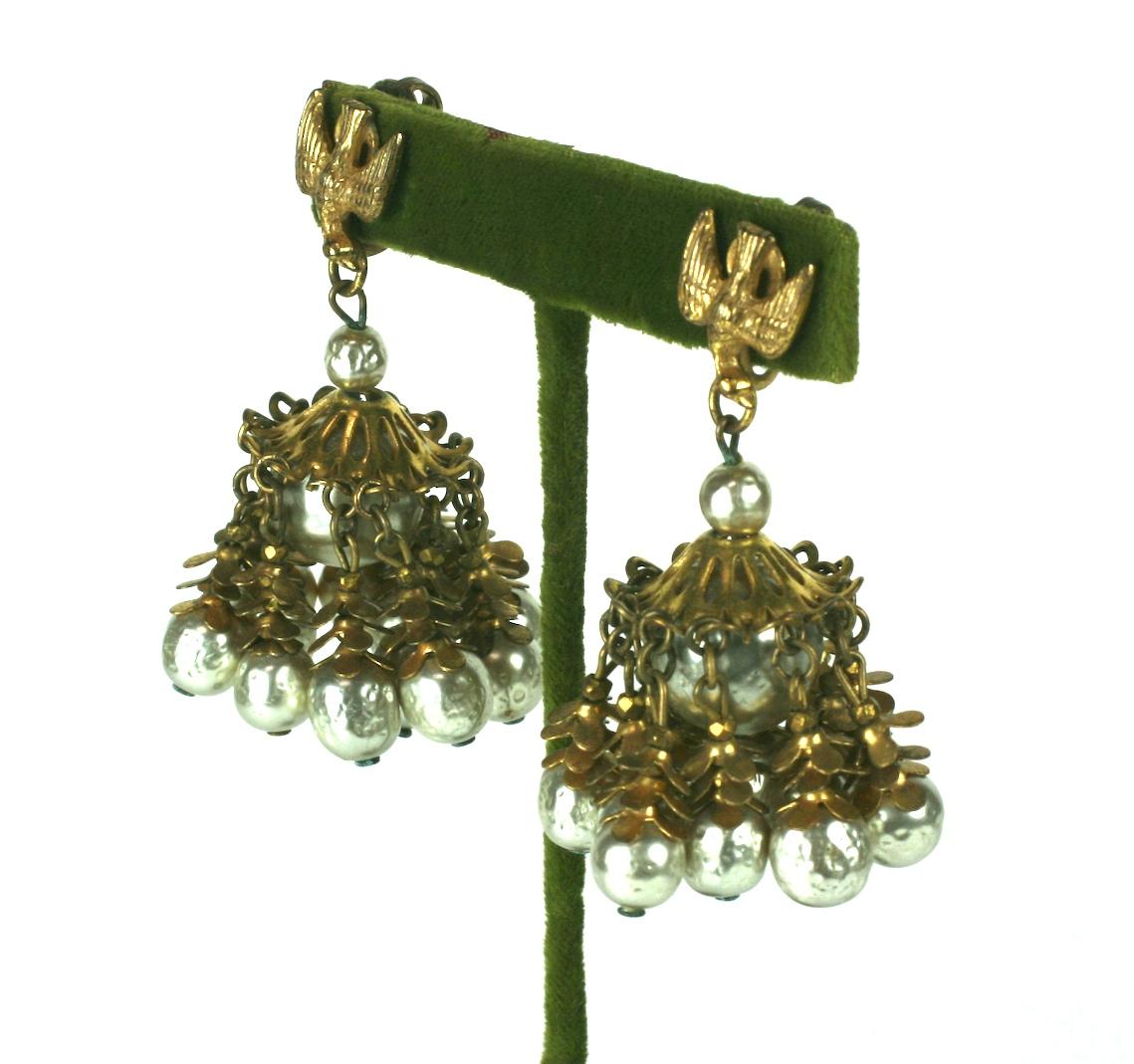Miriam Haskell Large Pearl Tassel Earrings from the 1940's. Signature bird motif sits on each ear, with a large pearl and Russian gilt capped tassel pendant.
Striking scale with great movement, Signed Miriam Haskell on clip back fittings. 
2.25