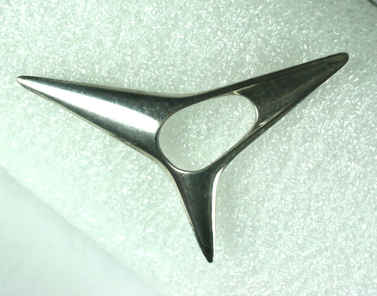 Georg Jensen Atomic Brooch by Henning Koppel. Wonderfully simple, spare but strikingly modern as all his designs are. 
Sterling silver. Signed Jensen, Artist Cipher, model 342. 
Excellent condition. 1960's Denmark.
3
