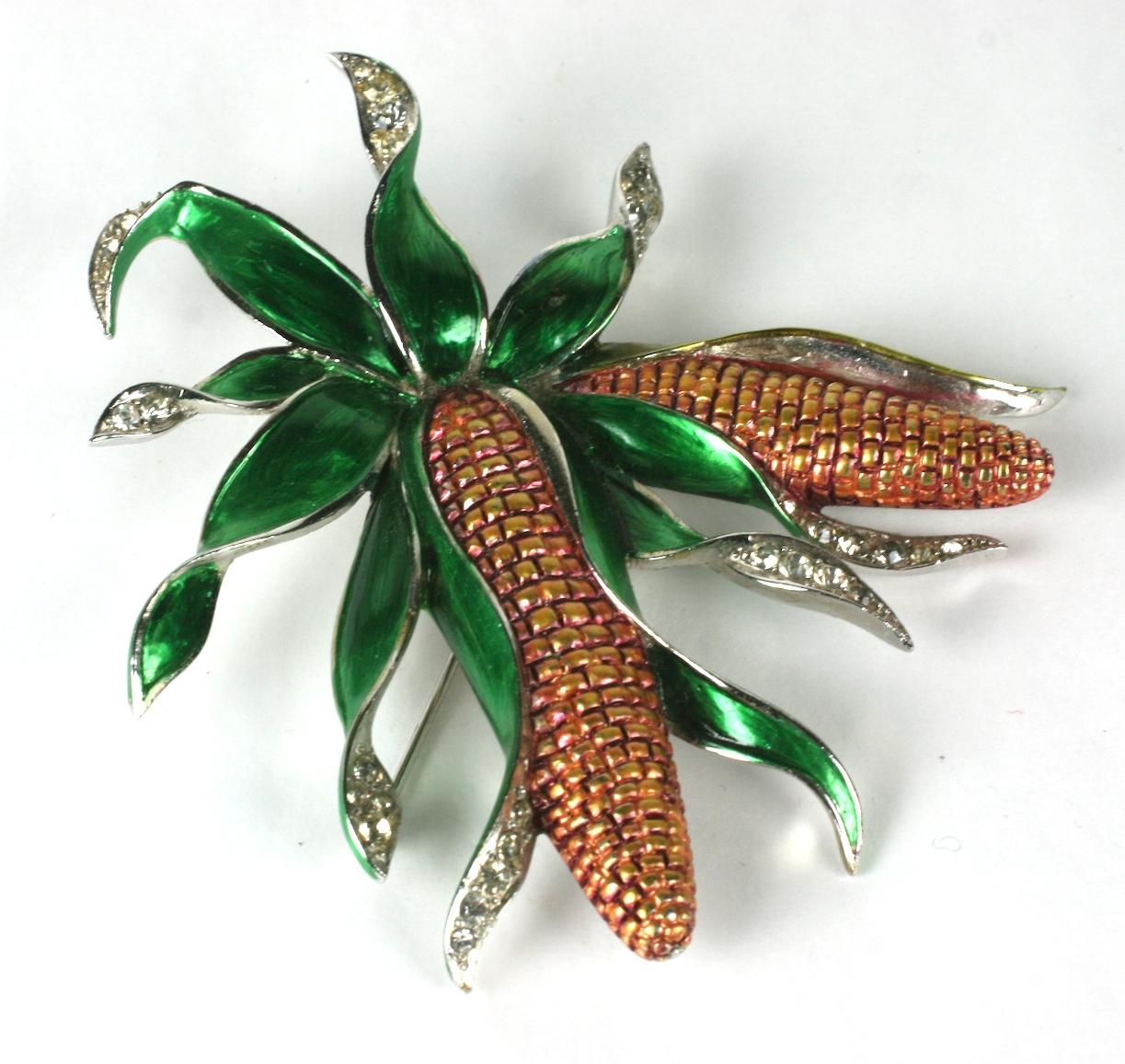 Rare and super collectible Marcel Boucher pearlized enamel corn on the cob brooch from 1941.
Of rhodium plated metal, crystal rhinestones, hand painted pearlized enameling.
Wonderful large scale and condition. 
Marked: MB phrygian cap, Des