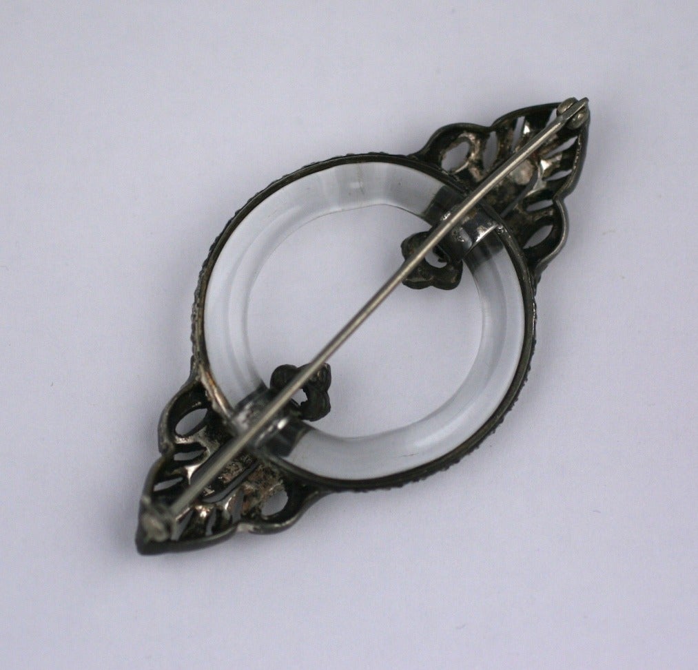 Art Deco sterling and crystal ring brooch from the 1920's. Bezel set crystal 