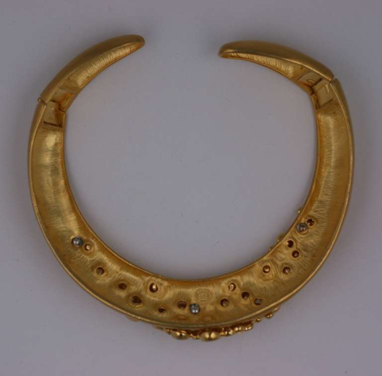 Givenchy matte gold collar with an applied  network of paste set stones. Double hinge opening on sides, 1990's France. 13