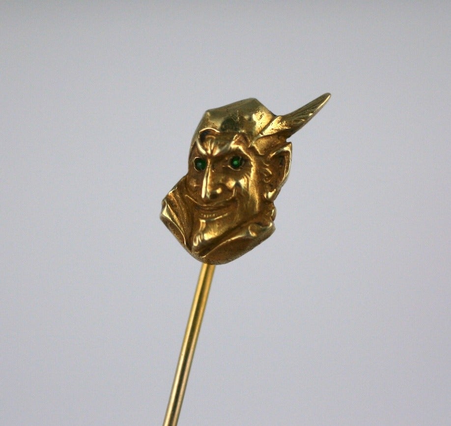 Antique Devil Stickpin from the turn of the 20th Century. Beautiful detailed with emerald eyes and a mischevious grin in 14K gold. Rare and unusual subject matter. 2.8