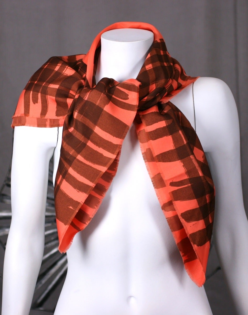 Geoffrey Beene's watercolor brushstroke scarf p[rinted on silk twill in browns on orange persimmon base. Very likely taken from one of Mr. Beene's personal designs. 32