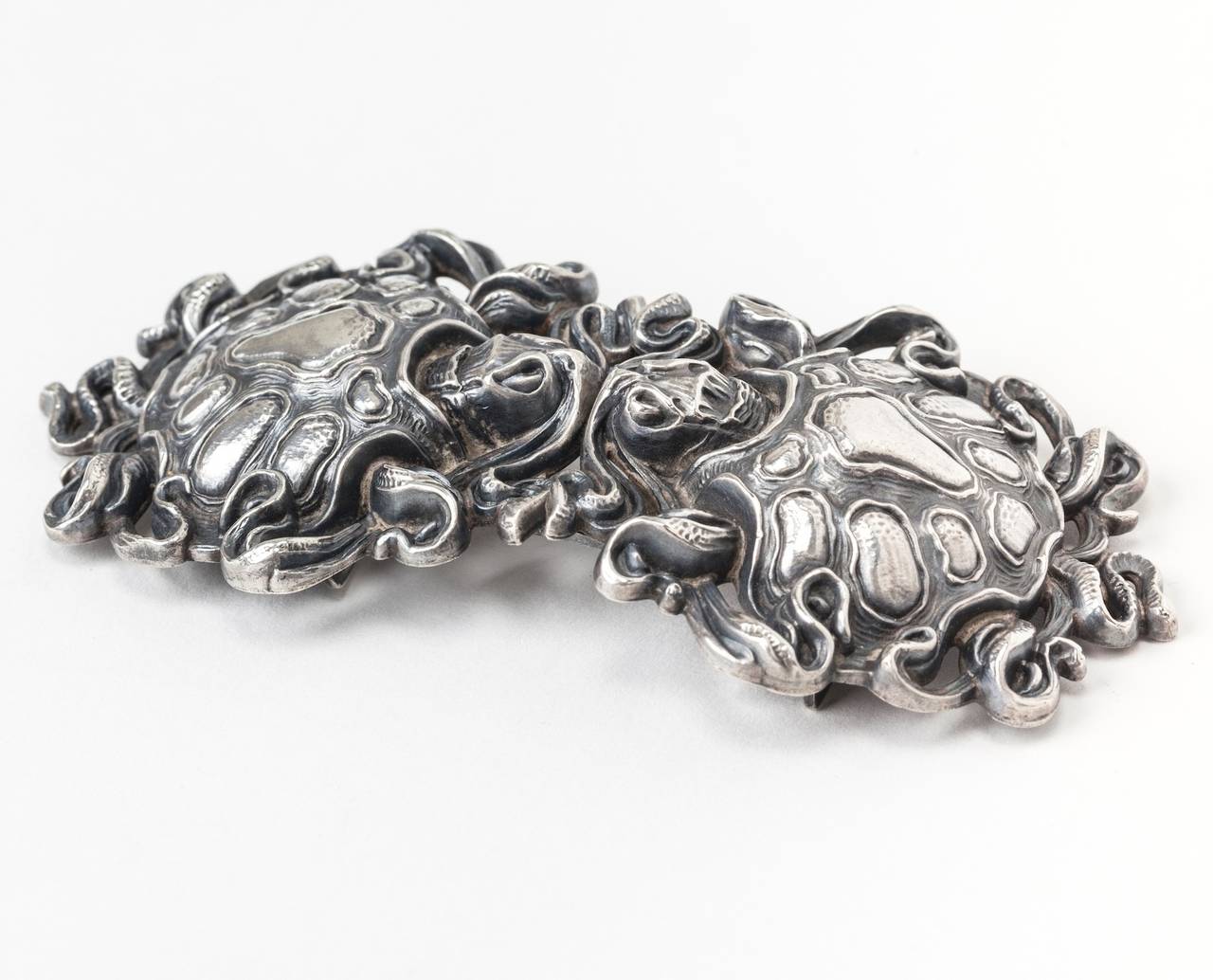Rare Kerr Art Nouveau Turtle Buckle in the form of abstract turtles with whiplash designs, possibly seaweed, surrounding them. Done in the hollow, high relief style Kerr is known for, the subject matter is highly unusual. Amazing detailing. 1890's