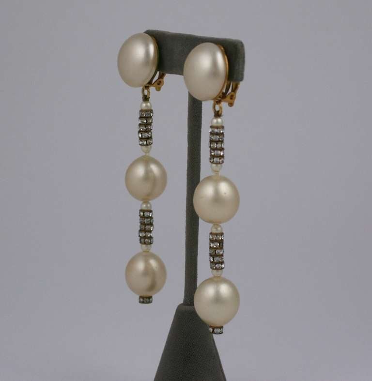 Elegant long pearl and rhinestone rondel earrings from Chanel, Paris.  Measuring 4