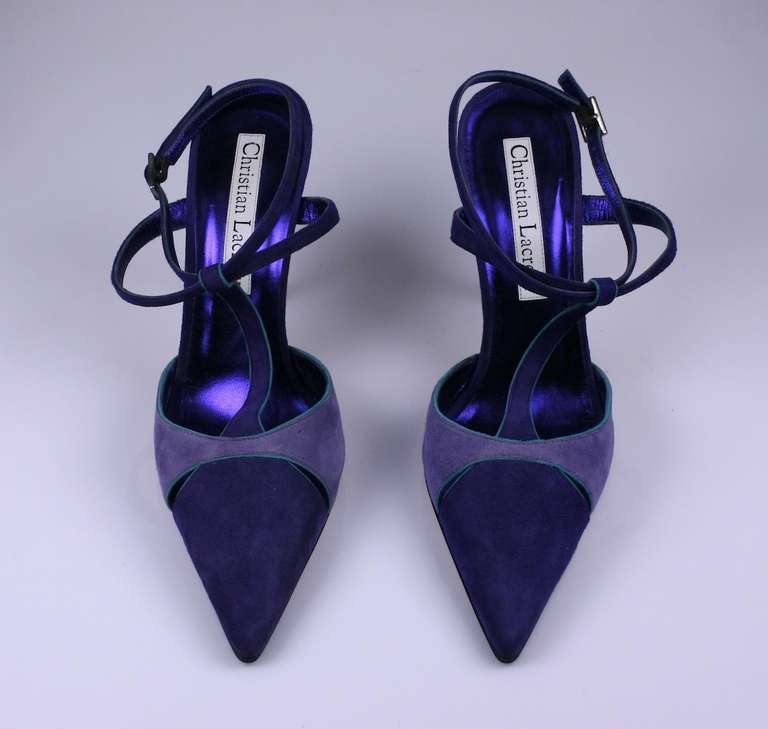 Christian Lacroix's elegant lilac and purple suede slingbacks piped in teal and lined in metallic leather. Excellent condition. 2000's France.
37.5 size