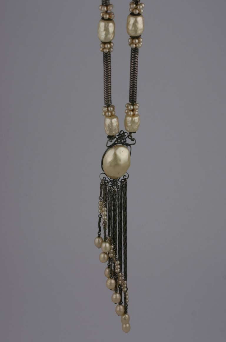Louis Rousselet antique silver woven snake chain with rolled wire work and handmade signature pearls. France 1920's.
25