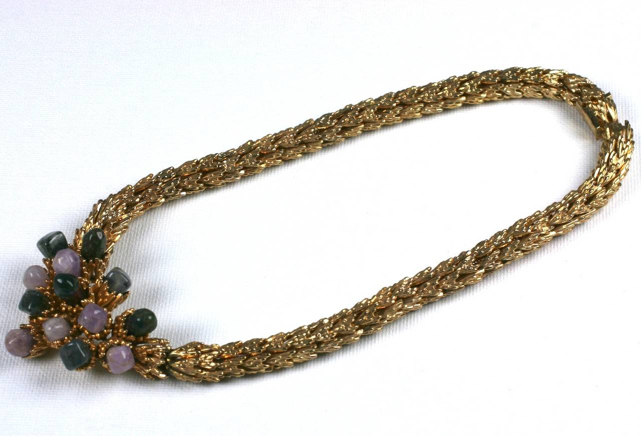 Grosse Amythest and Agate Modernist Necklace with a chain of gilded filigree caps. The central motif is sculptural, set with tumbled agates and amythests. Grosse produced high quality jewelry for companies such as Christian Dior. Germany 1970's.