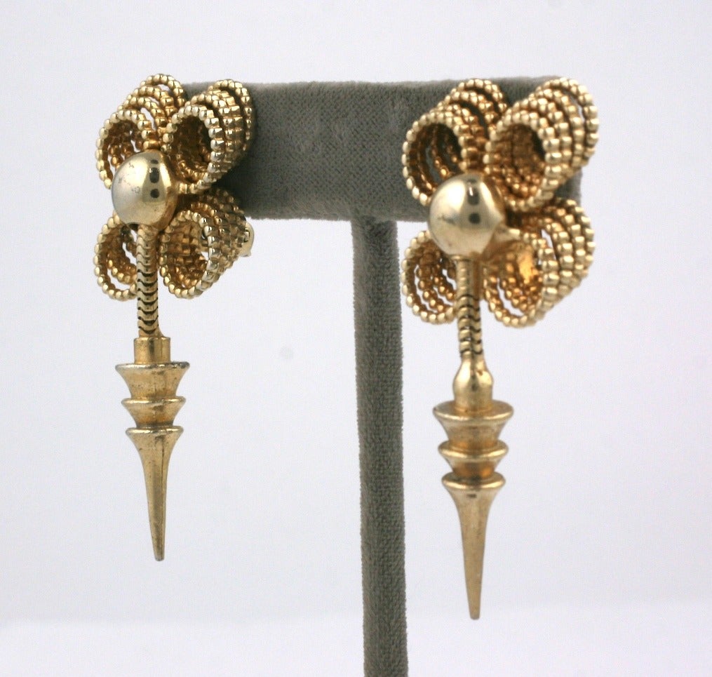 Reinad Retro Drop Earrings from the 1940's USA with clip back fittings. 4 sets of fluted rings are used to form a dimensional top for the pendulum drop. Unusual design.   2.25
