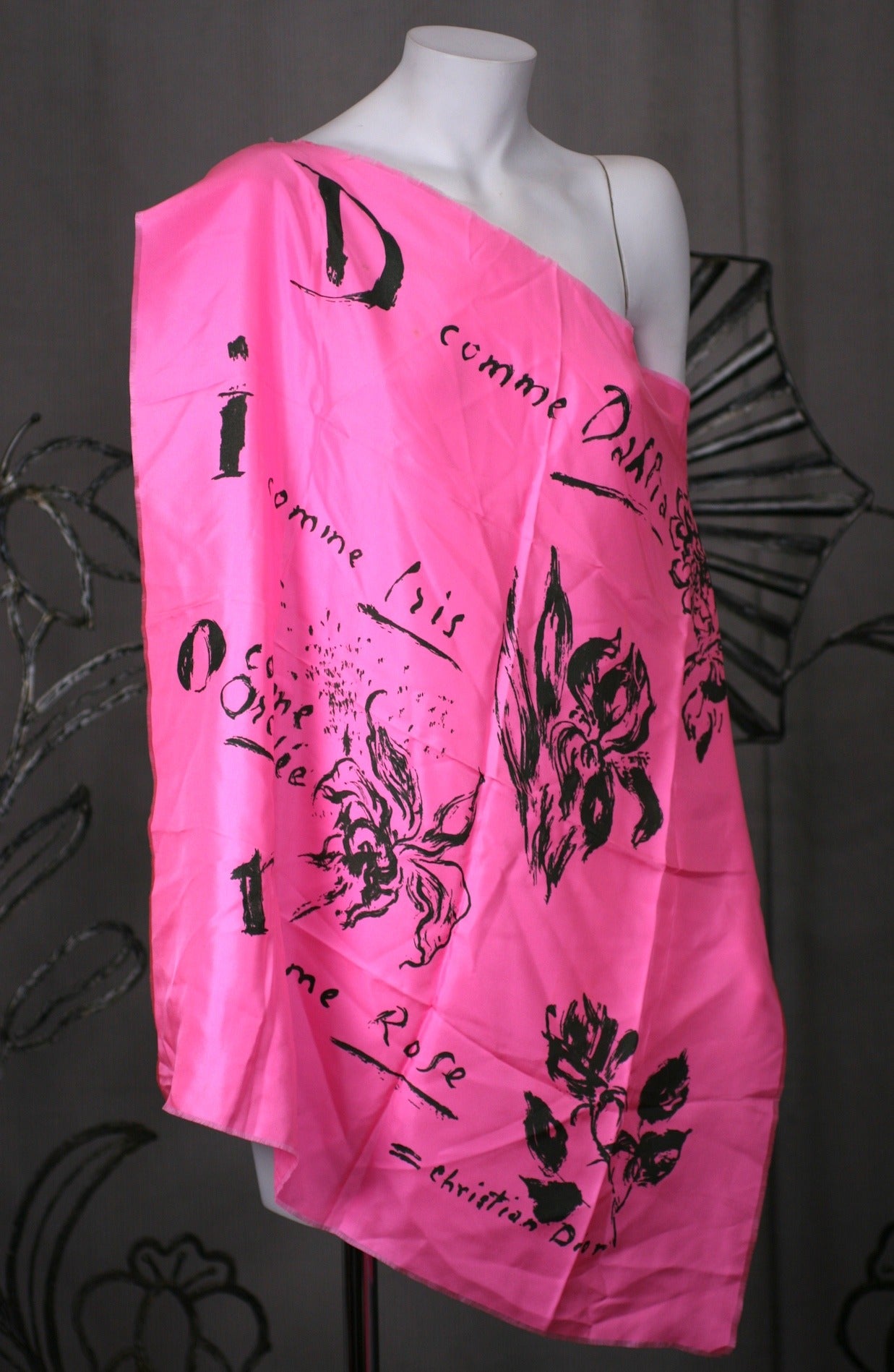 Christian Dior's silk flower scarf printed with Dior's name and corresponding flowers he loved. Self fringe. 26
