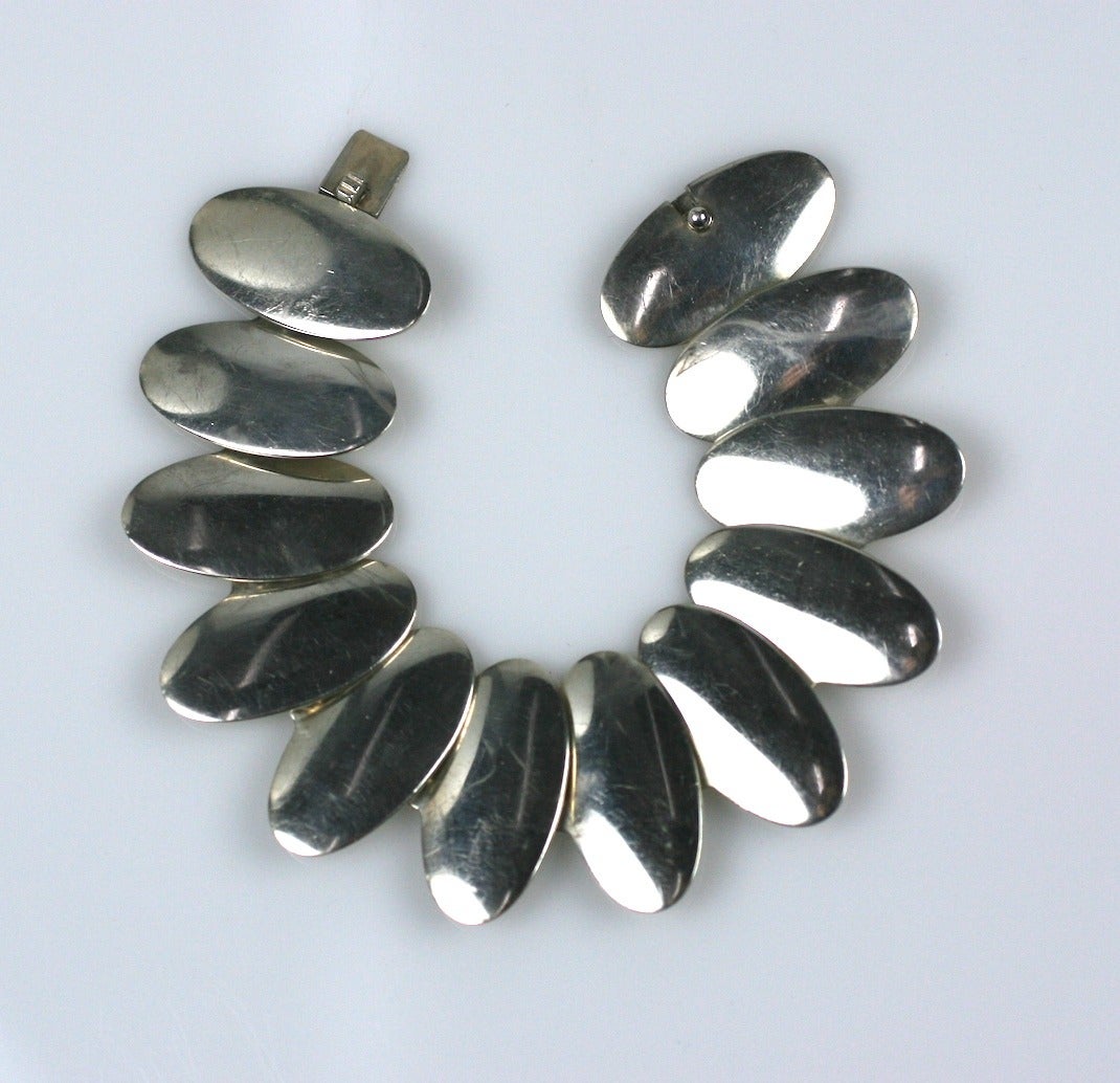 Danish Sterling Modernist Link Bracelet by N.E. From of oval discs in repeat formation. Sculptural and modern. 1960's Denmark. Excellent condition. 
7