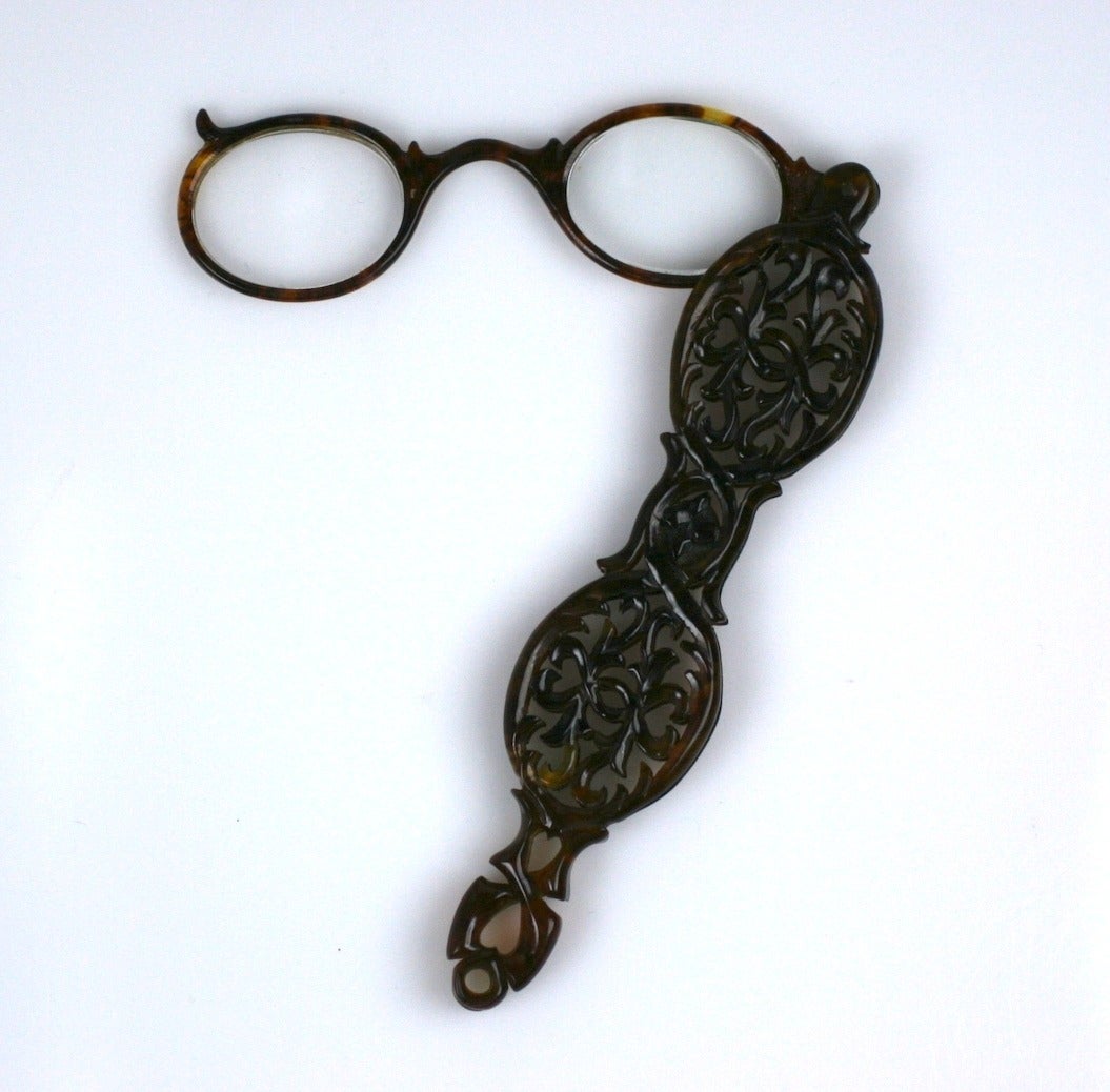 Victorian Hand Carved Lorgnette from the late 19th Century. Lovely hand carved (covered) openwork on both sides houses the lorgnettes attached with a hinge. Has loop carved, ready for a chain or ribbon holder. 1880's USA. 5.5