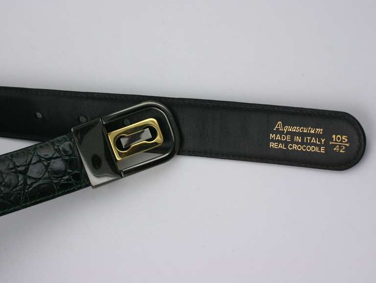 Mens Aquascutum deep green crocodile skin belt with unusual tri tone buckle in gumetal, silver and gold. Excellent condition. 1.2