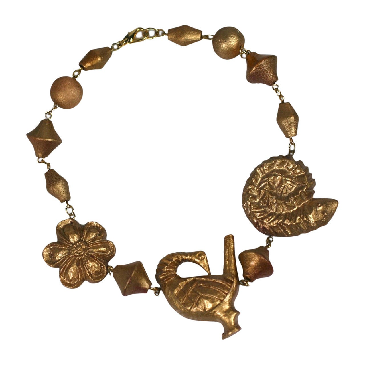 Kenzo Carved and Gilded Figural Necklace For Sale