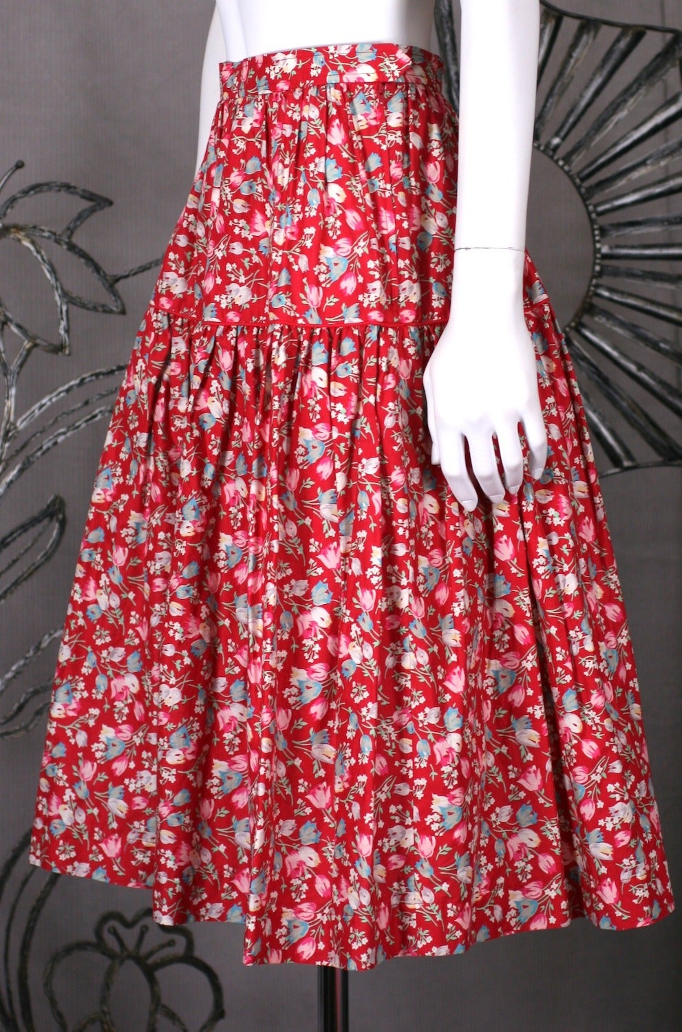 Yves Saint Laurent's Boussac cotton red floral skirt with pipe edged hip yoke and full skirt. 1980's France. Vintage Size 36. Excellent condition.