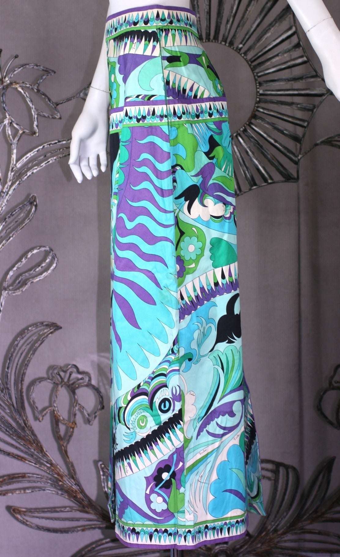 Emilio Pucci's Cotton Twill Maxi skirt in vibrant greens, purples with black and white. 
Patterned border on hem, waist, yoke and along front and back slits (15